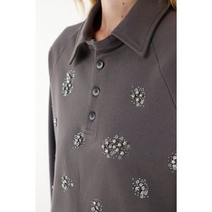Buzo gris oversize con apliques de brillo para mujer