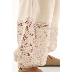 Pantalón en burda con bota enresortada crudo para mujer