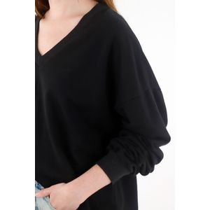 Buzo amplio cuello en V negro para mujer