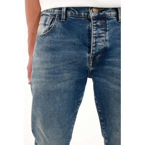 Jean Skinny tiro medio azul medio para hombre