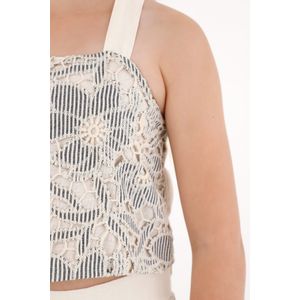 Camisa en tela tejida con diseño de flores para niña