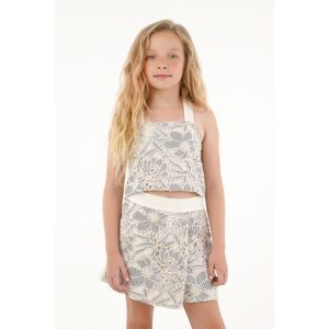 Camisa en tela tejida con diseño de flores para niña