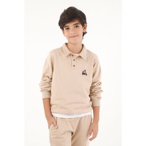 Buzo tipo polo con bordado café para niño
