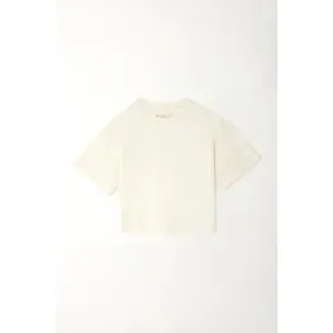 Camiseta boxy de largo pretinero crudo para niña