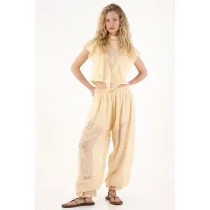 Pantalón tipo aladino amarillo para mujer