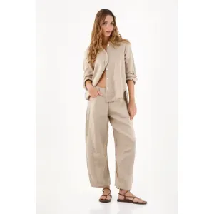 Pantalón mujer en lino arena pierna ancha minimalista